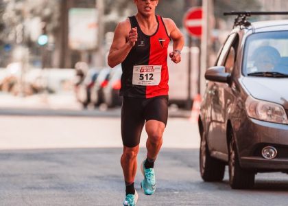 Athlete participating in a city marathon, showcasing endurance and focus.